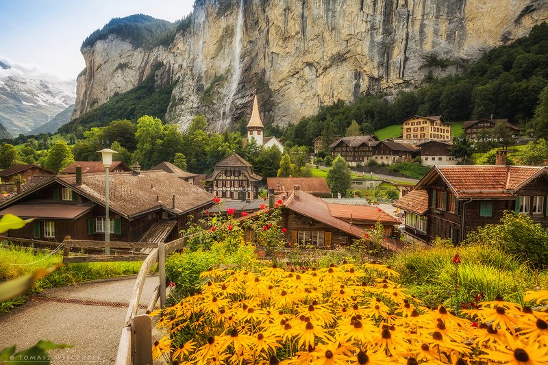 switzerland, landscape, sunrise, sunset, colours, awesome, amazing, adventure, travel, beautiful, swiss, waterfal, lauterbrunnen, village, flowers Life under a waterfallphoto preview
