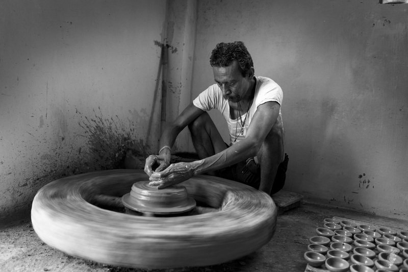 #candid #monochrome #bnw #men at work #potter The wheel of fortunephoto preview