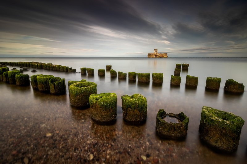 #landscape #seascape #waterscape #reflection #calm #sky #clouds #stones #canon #longexposure #nature #beautiful #colorful #jetty #seaweed #wood #dusk Torpedowniaphoto preview