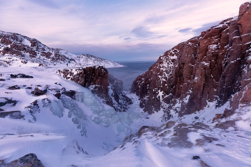 Teriberka, waterfall, cliff, sea, sunset, arctic, polar, snow, frost, winter Frozen waterfall. Teriberka, Russiaphoto preview