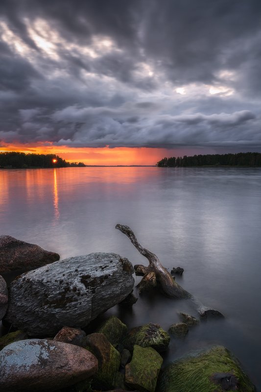 After Glow, Beach, Blue, branch, Clouds, Evening, Evening Glow, harmony, Hjalmaren, lake, Lichenes, Lichens, moss, nature, nature sight, outdoors, Peace, Rock, Scandinavia, Sunset, Sweden, tranquility, trees, Water Unexpected Breakthroughphoto preview