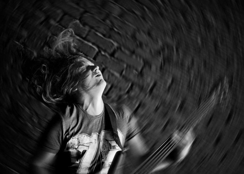 music, radial, play, bass, guitar, black and white, long hair, wall, euphoria, 50mm, natural light Euphoriaphoto preview