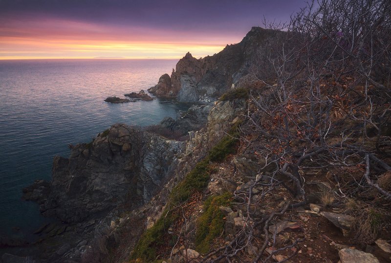 закат краски свет скалы россия приморский край находка мыс пассека скалы море дмитрий подкопаев Угасающий светphoto preview