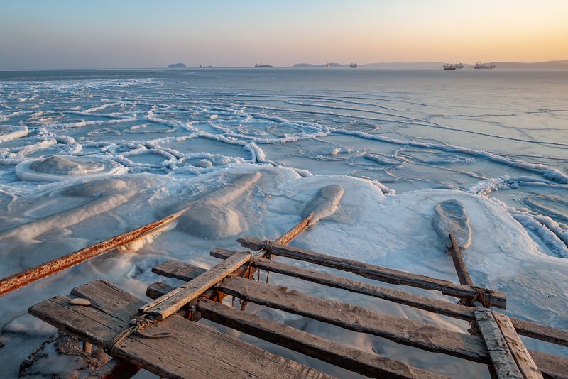 Nature, Winter, Snow, Outdoors, Landscape, Sea, Water, Ice, Scenics, Cold - Temperature, Blue, Lake, No People, Sky, Frozen, Frost, Wood - Material, Day, River, Weather Ice Pathphoto preview