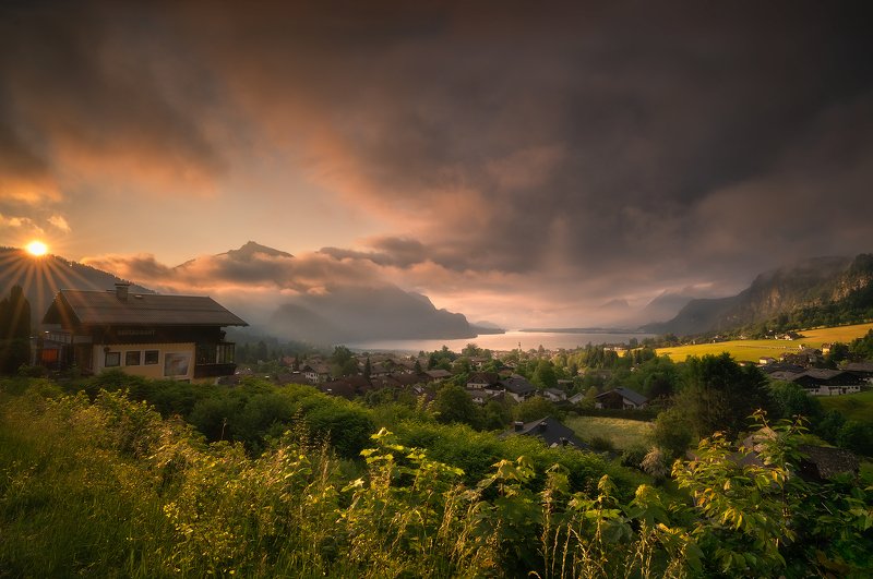 Austria, Bushes, church, Church Tower, Cliffs, Clouds, cloudy, fog, foggy, Grass, Hills, lake, Lake Wolfgang, morning, Morning Mist, Morning Mood, Mountain Range, mountains, outdoors, Salzburg, Salzkammergut, St. Gilgen, Sun, Sun beams, Sun lit, Sun rays, St. Gilgen am Wolfgangsee, Austriaphoto preview