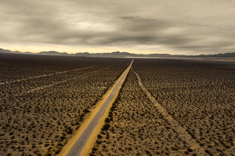 nevada ,usa ,america ,road ,desert ,desertroad ,straightroad ,clouds ,storm ,mountains ,landscape ,drone ,sepia ,moody ,onedirection ,linesinsand ,desertlines ,lonelyroad ,highway ,unitedstates ,unitedstateshighway ,northamerica ,exploredeserts ,northamer Infinitephoto preview