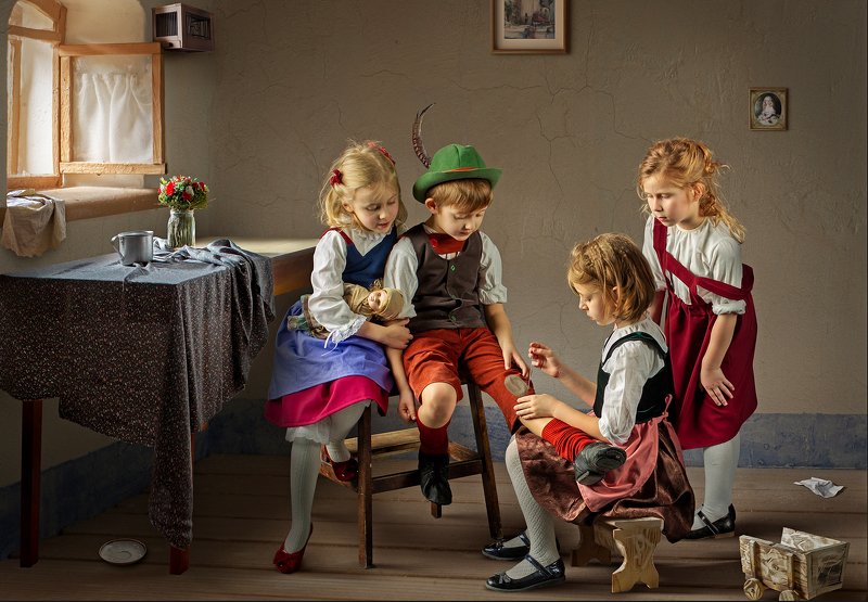 Young girl mending pantsphoto preview