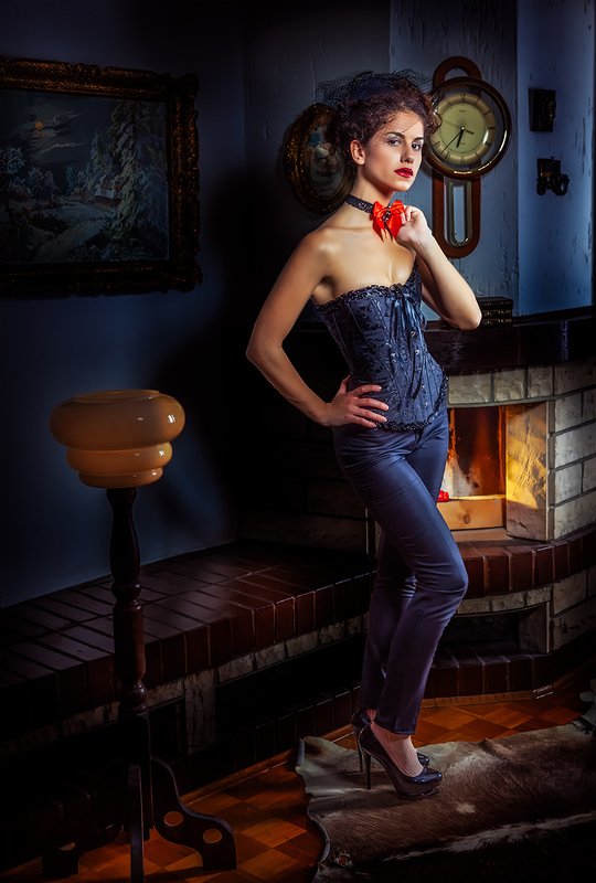 girl, lamp, fireplace, clock, painting, tie, high heels, corset Influencephoto preview