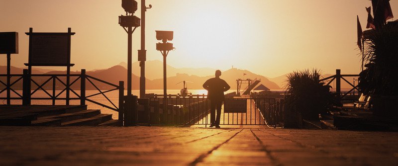man, morning, pier, sun, sunshine, sunrise, cinematic, cine, colors, colorgrade, colorgrading Man at the pier in the morningphoto preview