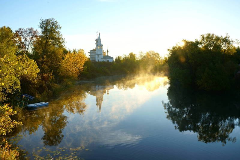 russia, suzdal, landscape, morning, houses, river, autumn, reflection, sunlight, fog, travel, beautiful, kamenka, boat Kamenka River in Autumnphoto preview