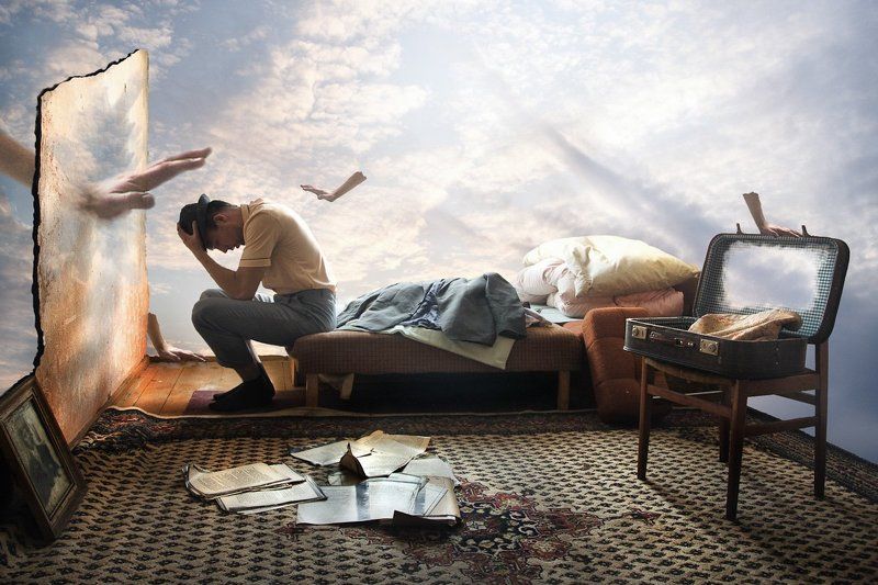 man, fotomontage, color, clouds, wall, chair, paper, hands , material form Slow loss of material formphoto preview