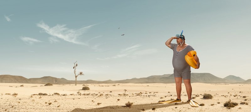humor,funny,fat,man,swim,desert,dry,heat,looking,searching,beach,snorkeling Should be somewhere...photo preview