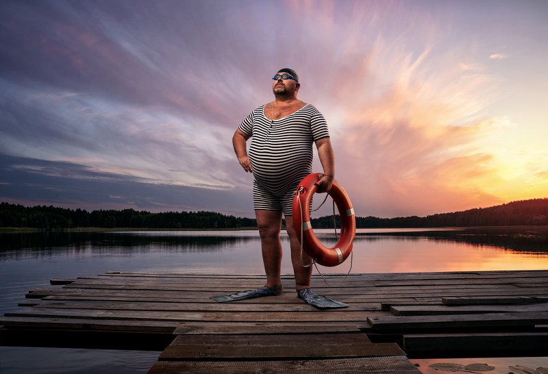 humor,funny,fat,man,portrait,swim,swimmer,lake,sunset The swimmerphoto preview