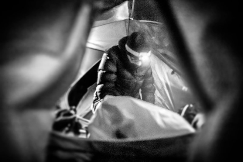 canada, camping, morning, bruce peninsula, tent, black and white,. b&w, no color, man, winter, jacket, zima, packing, inside tent, adventure, travel, Chilly morningphoto preview