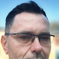 Portrait of a photographer (avatar) Krzysztof Asztemborski